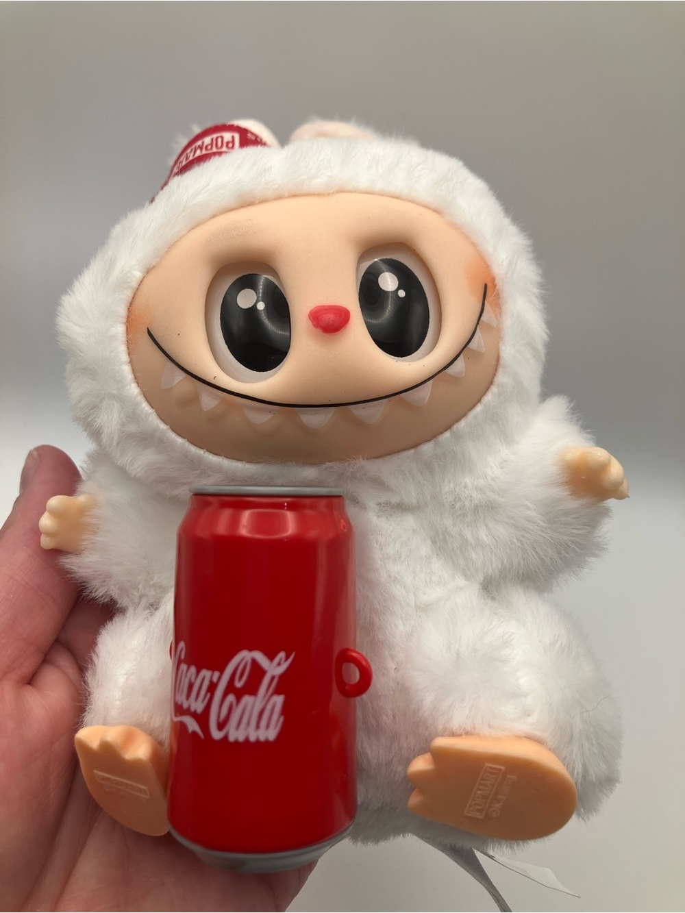 White Furry Yeti Plush Toy with Red Coca-Cola Can